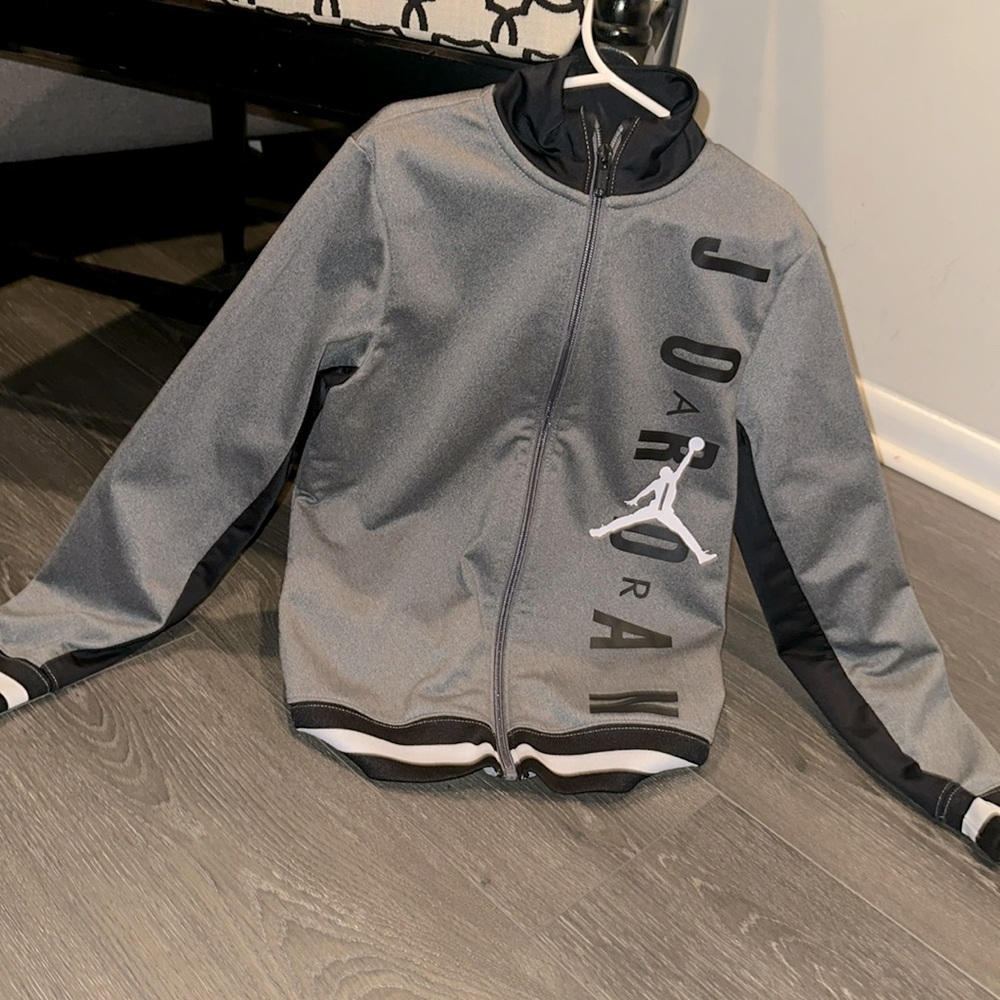 Jordan light jacket, zips up, goes with everything and it look brand new